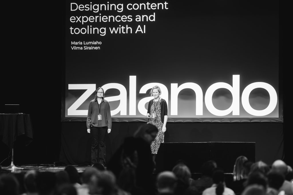 Maria Lumiaho and Vilma Sirainen presenting at Grand One AI Day 2025